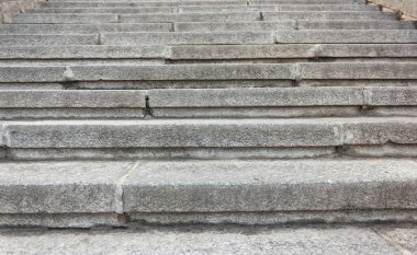 Concrete gray staircase in a horizontal plane frontal view
