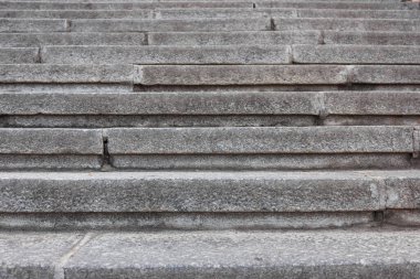 Concrete gray staircase in a horizontal plane frontal view