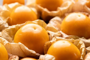 Pile of cape gooseberry or goldenberry fruit. Close up shot clipart