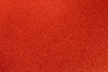 Bright red glittering background. Concept for holiday. Place for text.