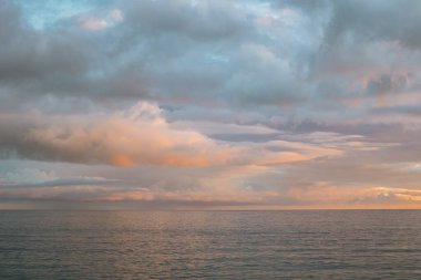 Amazing view of an Adriatic sea on a sunset, Montenegro. Beautiful cloudy sky.