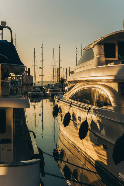 Amazing view of a marina and boats in Porto Montenegro on a sunset. Travel destination in Montenegro.