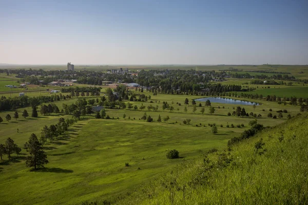 New Salem,  North Dakota with a population of 973, is a small farming town where visitors are greeted by Salem Sue, the worlds largest Holstein cow. Pictured here with clear skies on a summer day. 