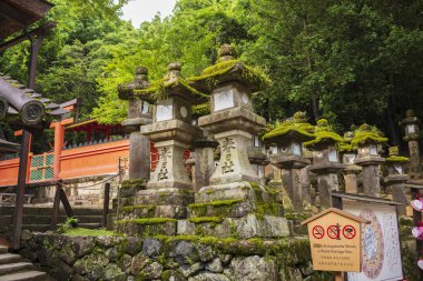 Nara, Japan, June 18, 2024: Exploring the colorful Kasuga Taisha Shrine with 3,000 lanterns. This Shinto shrine, pictured here with no people, is considered one of Japan's 