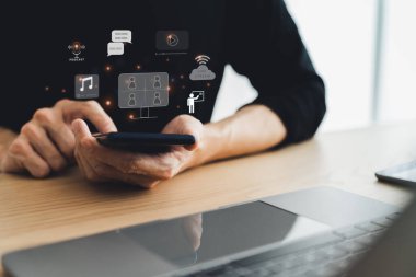 Businessperson using laptop for working or meeting online via social media application or social connection via cyberspace or internet, Globalize business communication wireless technology network.