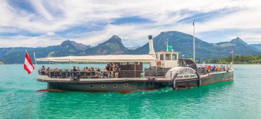 Sankt Gilgen, Austria - 07 14 2023: historic cruise ship sailing on the lake, Wolfgangsee clipart