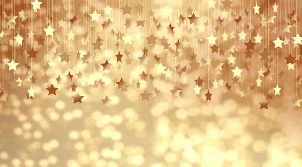 white gold blurred background with small gold stars elements close up.