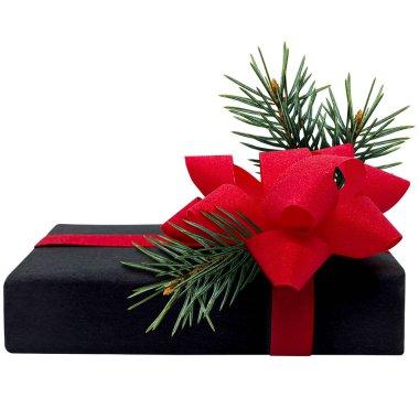 Kırmızı kurdeleli ve ladin dallı zarif siyah hediye kutusu, beyaz arka planda izole edilmiş Noel için mükemmel.