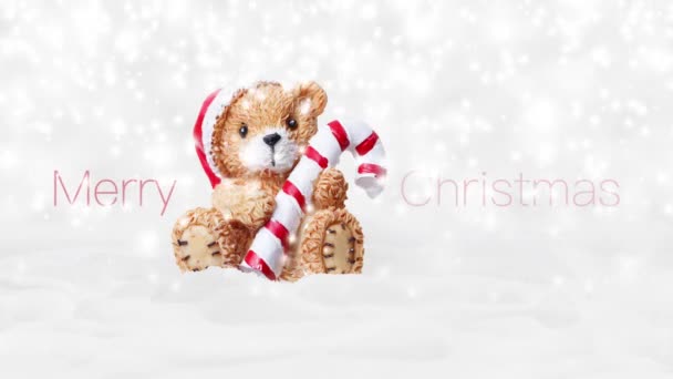 Frohe Weihnachten Text Und Teddybär Mit Rotem Hut Und Zuckerstange Lizenzfreies Stock-Filmmaterial