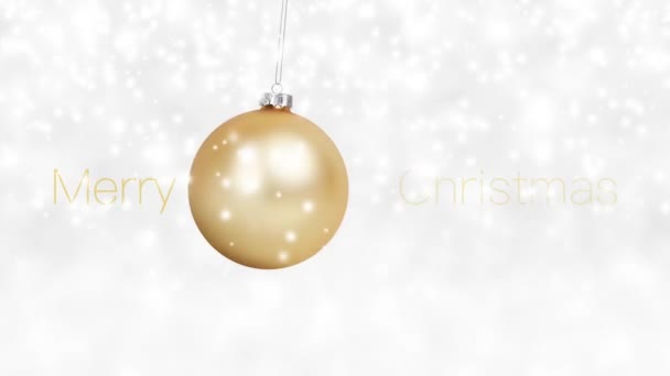 Frohe Weihnachten Text Und Hängende Goldene Kugel Baumelt Isoliert Auf Stockvideo