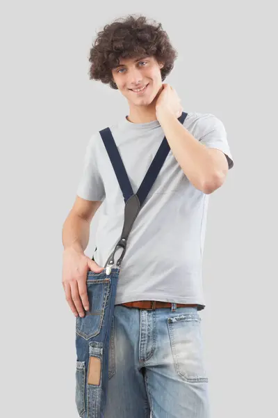 Jovem Sorrindo Bonito Vestido Jeans Camiseta Com Bolsa Ombro Isolado Imagens Royalty-Free