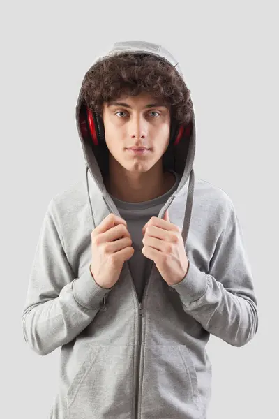 Handsome Young Man Wears Headphones Hoodie Sweatshirt Isolated Gray Background Stockafbeelding