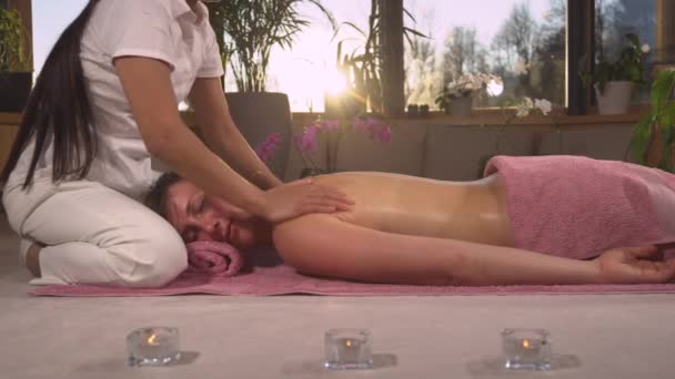 Close Young Female Person Relaxing While Receiving Therapeutic Back Massage — Stock Video