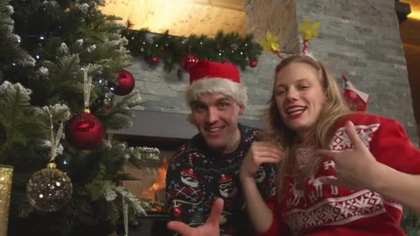 Portrait Joyful Young Couple Singing Dancing Together Christmas Tree Happy — Stockvideo