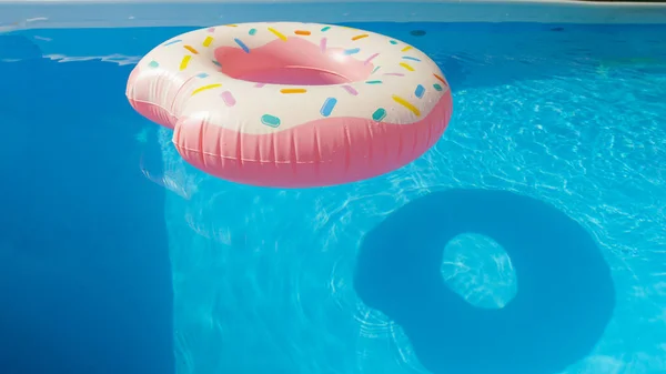 Close Colorful Inflatable Donut Floats Empty Aqua Colored Pool Someone — Stock Photo, Image