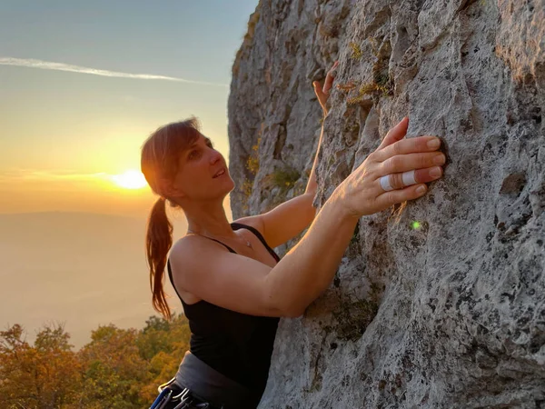 Happy Female Climber Scales Challenging Cliff Sunlit Crni Kal Slovenia — Zdjęcie stockowe
