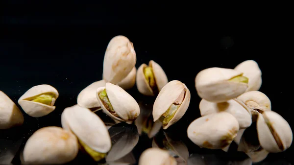Macro Dof Raw Pistachio Nuts Get Scattered Cloth Covered Table — Zdjęcie stockowe