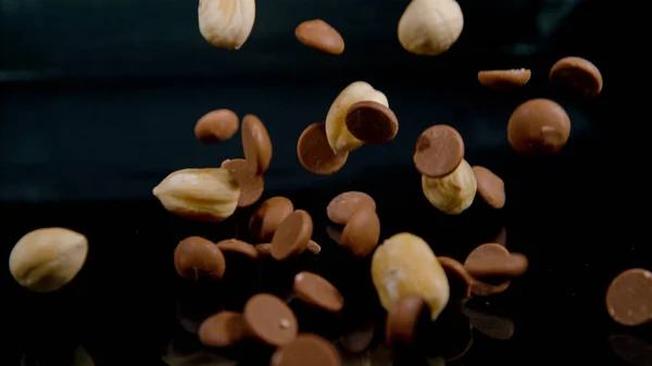 Macro Dof Mix Tasty Blanched Hazelnuts Sweet Milk Chocolate Drops — Stock Photo, Image