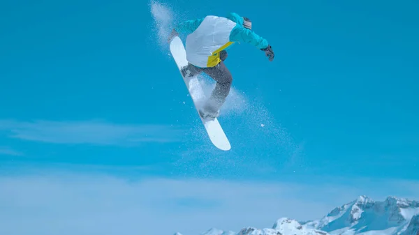 Snowboarder Flies Air Does Spinning Nose Grab While Having Fun — Stock Photo, Image