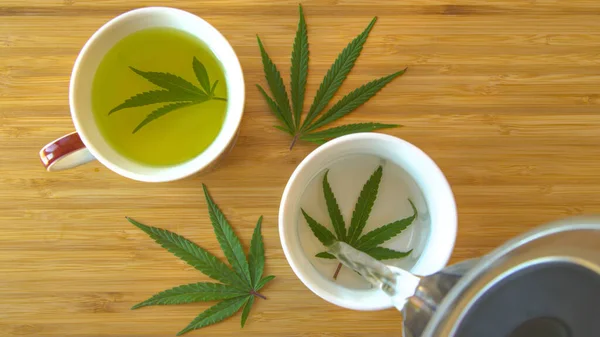 Hot Water Gets Poured Homegrown Marijuana Leaf White Teacup Sitting — Stockfoto