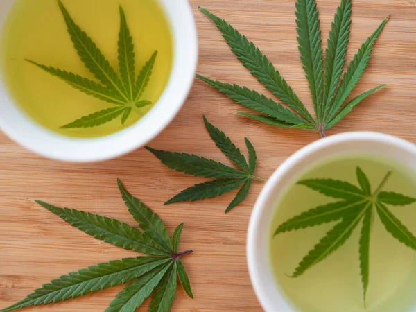 Detailed Shot Two Teacups Filled Illegal Homebrewed Marijuana Tea Homegrown — Stockfoto