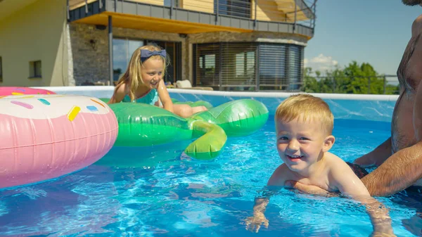 Close Smiling Little Boy Floating Backyard Swimming Pool Learning Swim — Stock Fotó