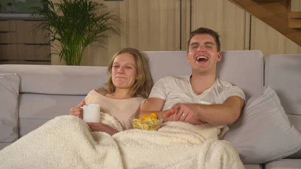 Young Couple Enjoying Comfy Sofa Watching Entertaining Show Married Couple — Stockfoto