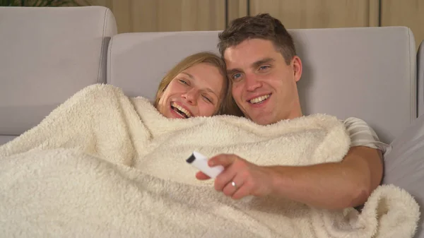 Cute Couple Snuggling Blanket Couch Watching Television Young Pair Sitting — 图库照片