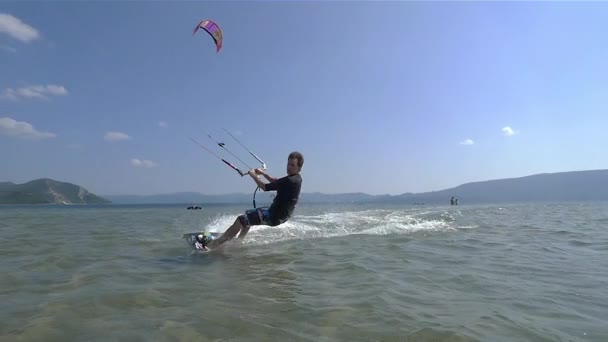 Slow Motion Kiteboarder Jumping Camera — Stock video