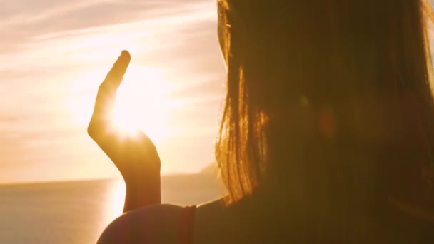 Lens Flare Close Beautiful Sunbeam Shines Hands Young Woman She — Stock Video
