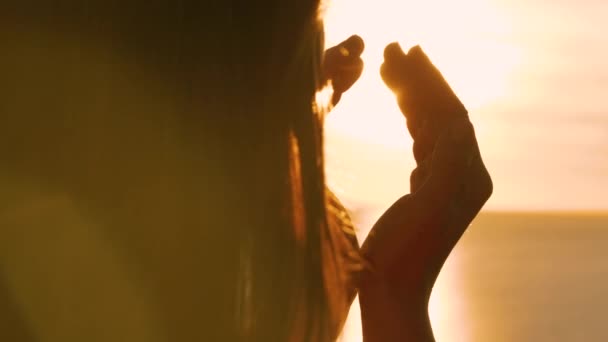 Lens Flare Close Playful Woman Tries Catch Golden Sun Her — Stock Video