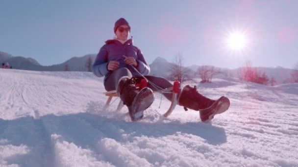 Slow Motion Close Pretty Woman Smiling While Sledging Snowy Slope — Stock Video