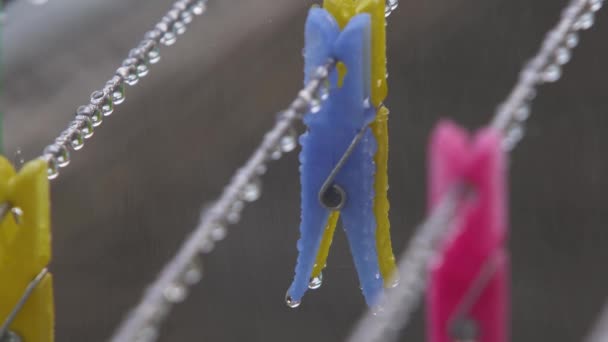 Wet Clothespins Rain — Stock video