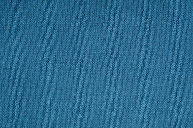 Sweater texture background. Blue wool knitted texture abstract background