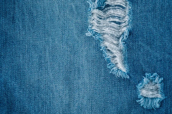 Džíny Detailní Záběr Modré Džínové Tkaniny Textury Pozadí Roztrhané Džíny — Stock fotografie
