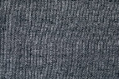 Süveter dokusu arka planı. Gri siyah örülmüş doku soyut arkaplan