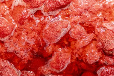 Red Strawberry jam background with gurgles and bubbles clipart