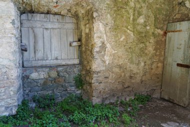 Stables door of the Malaspina Castle in Fosdinovo, Tuscany, Italy