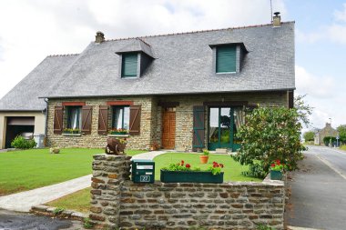 Typical house in the village of Moidrey in Normandy, France clipart