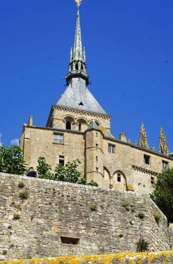 Bell tower of the Abbey of Mont Saint Michel in Normandy, France clipart