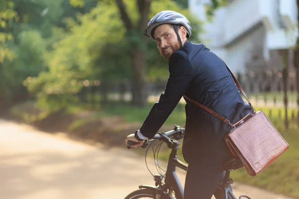 Smiling Male Entrepreneur Elegant Suit Riding Bike Work Early Morning Telifsiz Stok Fotoğraflar