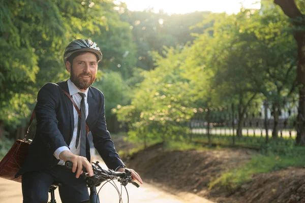 Smiling Brunet Male Office Worker Riding Bike Work Warm Sunny Stok Fotoğraf