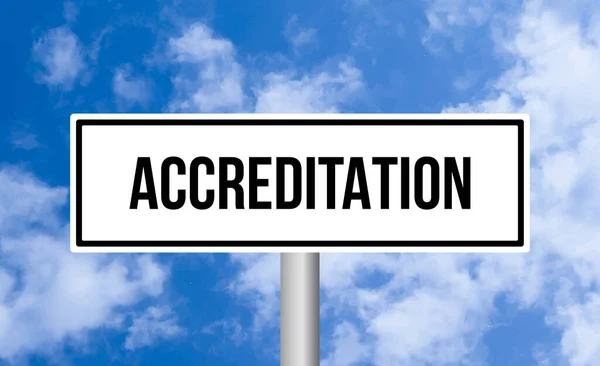 stock image Accreditation road sign on cloudy sky background