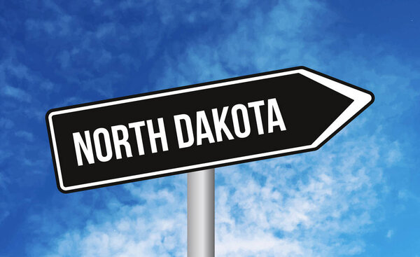 North dakota road sign on blue sky background