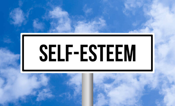 Self-esteem road sign on blue sky background
