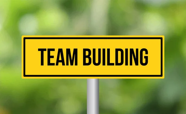 Team Building Road Sign Blur Background — Stock Photo, Image