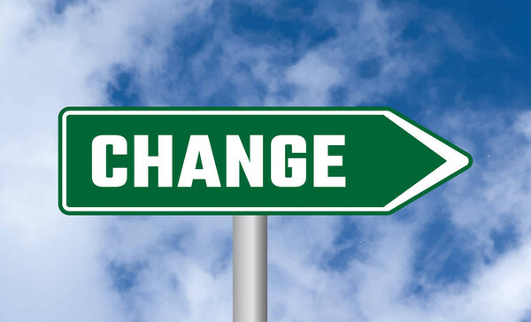 Change road sign on blue sky background