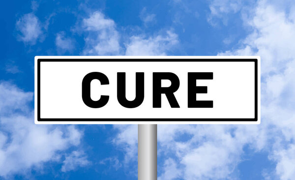 Cure road sign on cloudy sky background