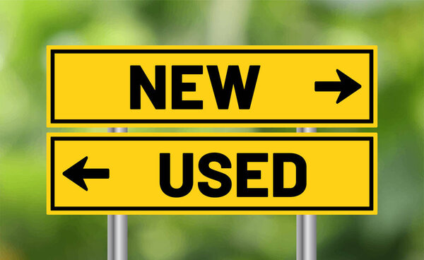 New or used road sign on blur background