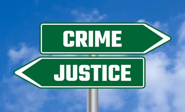 Verbrechen Oder Gerechtigkeit Straßenschild Auf Himmel Hintergrund — Stockfoto
